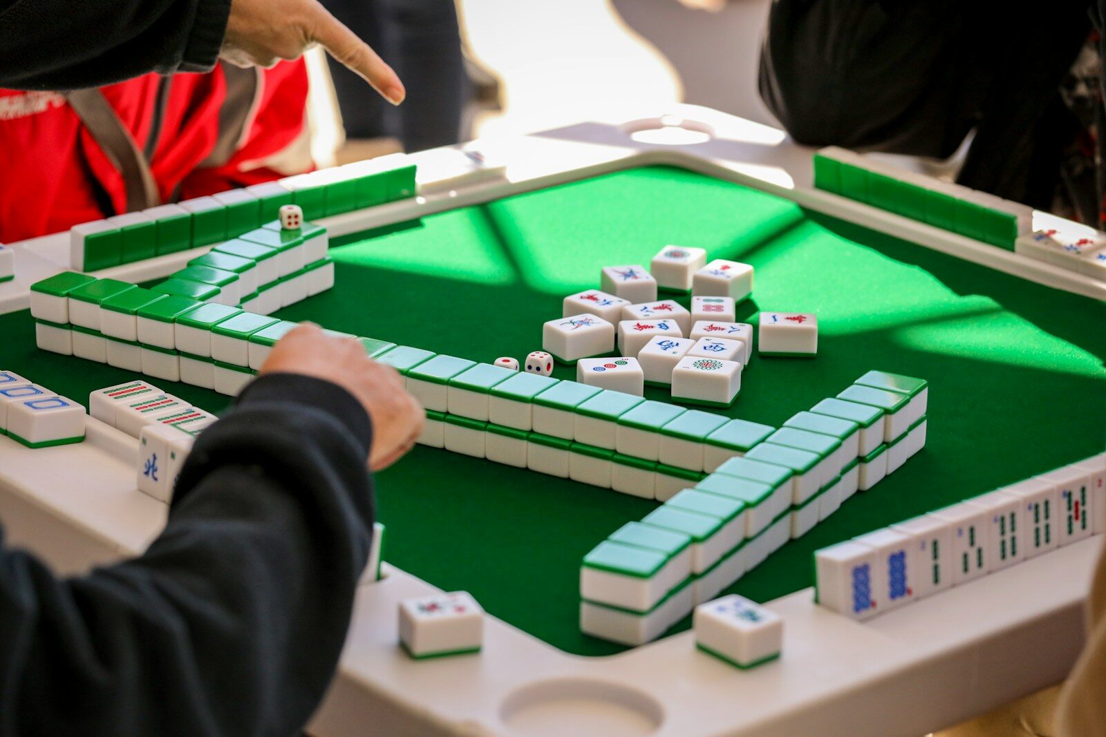 a close up of a game of mahjong on a table